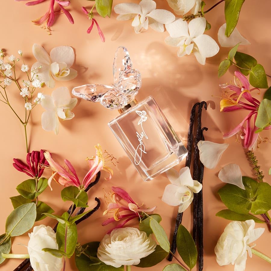 SCENT BEAUTY Dolly Tennessee Sunset lip gloss complements the scent with a fruity floral finish.