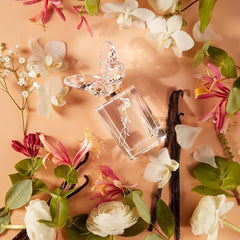 SCENT BEAUTY Dolly Tennessee Sunset lip gloss complements the scent with a fruity floral finish.