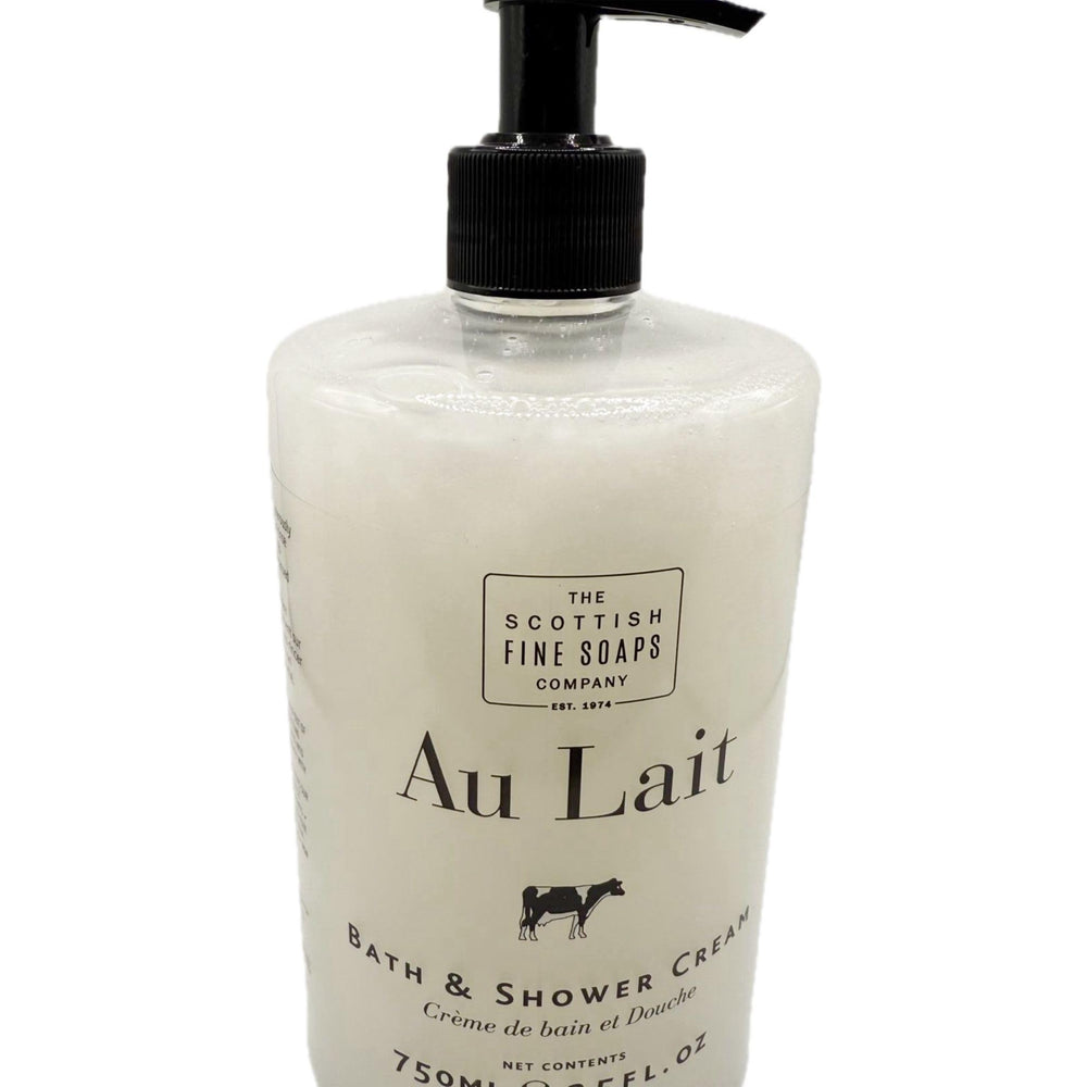 Lathering Au Lait bath cream on wet skin, ready for cleansing ritual.