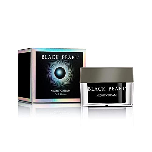 Sleek Black Pearl Night Cream jar beside pillow for night-time protection
