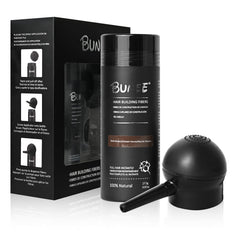 Seaboll hair-building fibers in dark brown close-up blend naturally for a fuller look.
