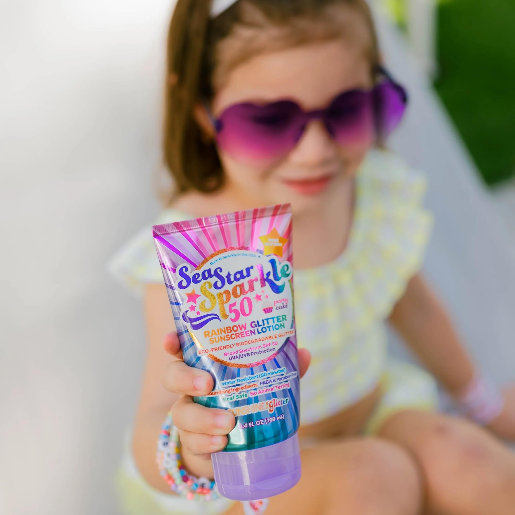 Seastar Sparkle water-resistant symbol with poolside scene.
