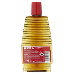 Seborin Haarwasser application on hands shows easy scalp massage for comfort.