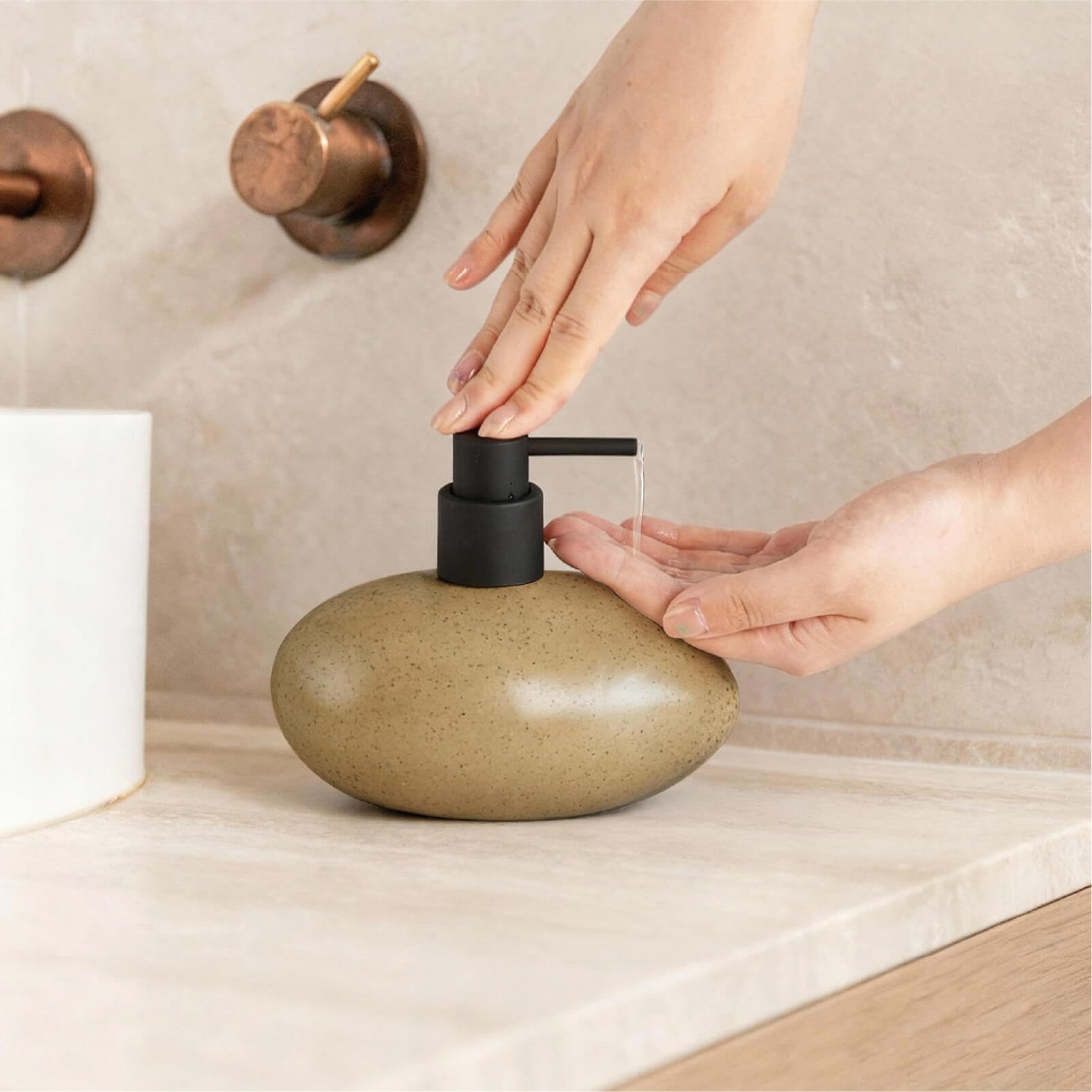 SEICASAYA stone-shape dispenser suits homes and offices for neat soap access.