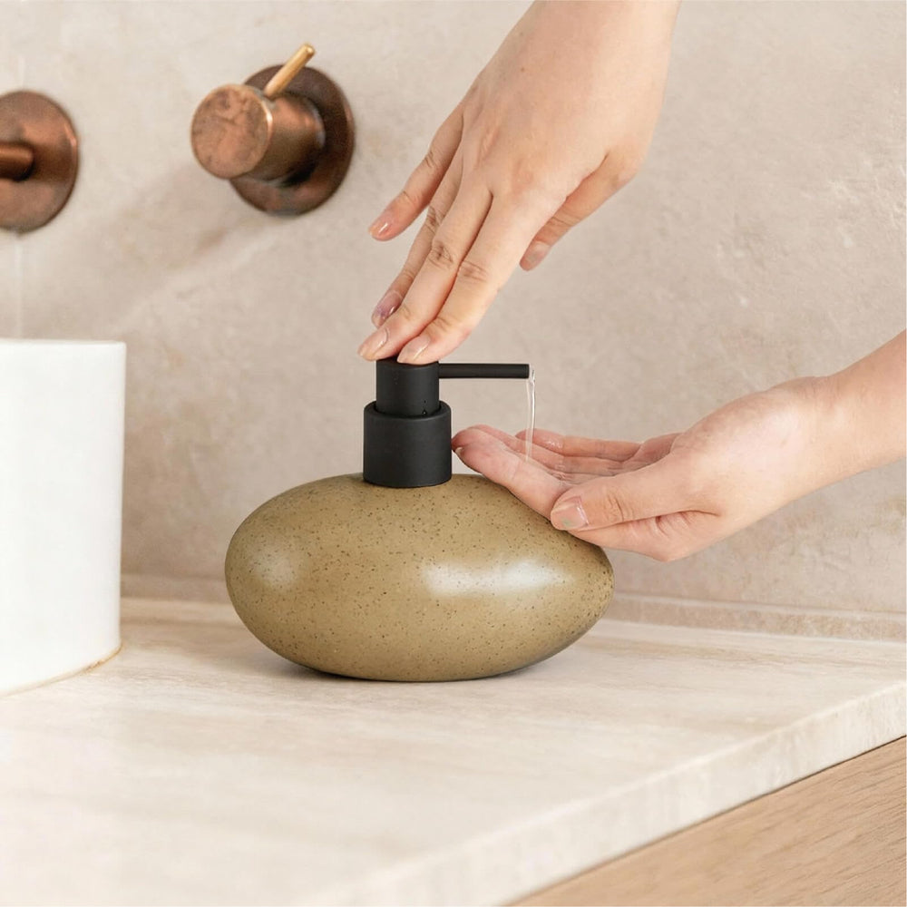 SEICASAYA stone-shape dispenser suits homes and offices for neat soap access.