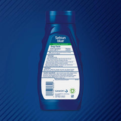 Selsun Blue Aloe bottle pour illustrating creamy lather for dandruff control.
