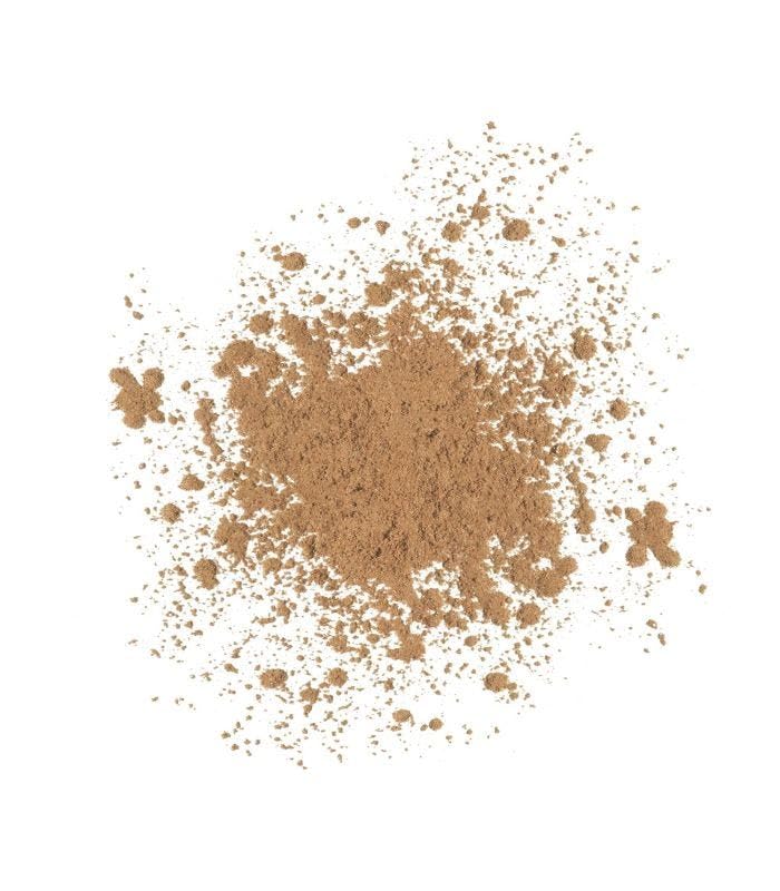 SeneGence loose setting powder on skin application for a natural finish.