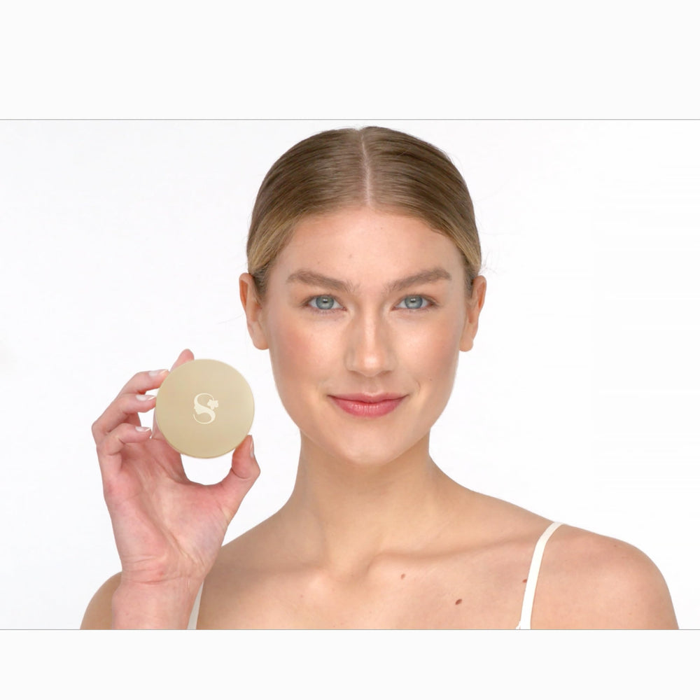 SeneGence packaging closeup showcases talc-free, skin-friendly formula.