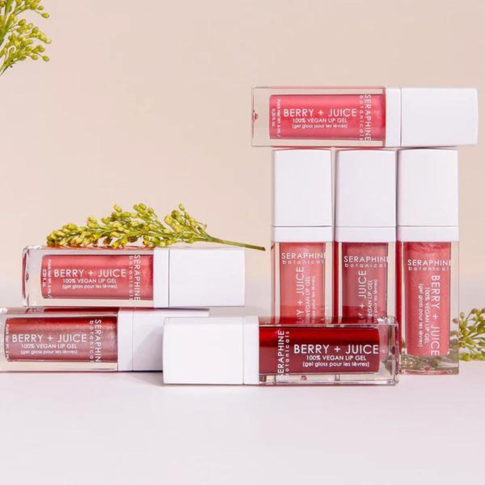 Seraphine Botanicals Berry + Juice gloss shining on lips for a hydrated look