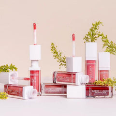 Seraphine Botanicals Berry + Juice wand applying precise lip color