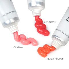 Seraphine Botanicals Just Bitten Tint lip balm offering berry tint and glossy finish.
