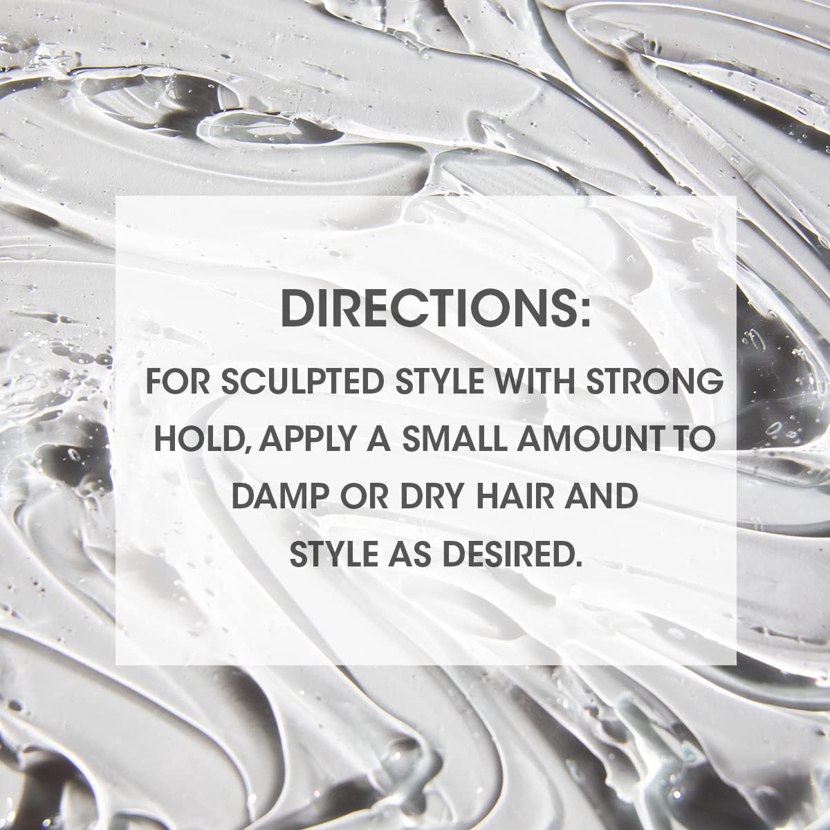 Hair styled with SEVEN KENTE SCULPT for sleek wet-look finish