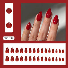 Sevgob red almond nails close-up showing solid red color and glossy finish.