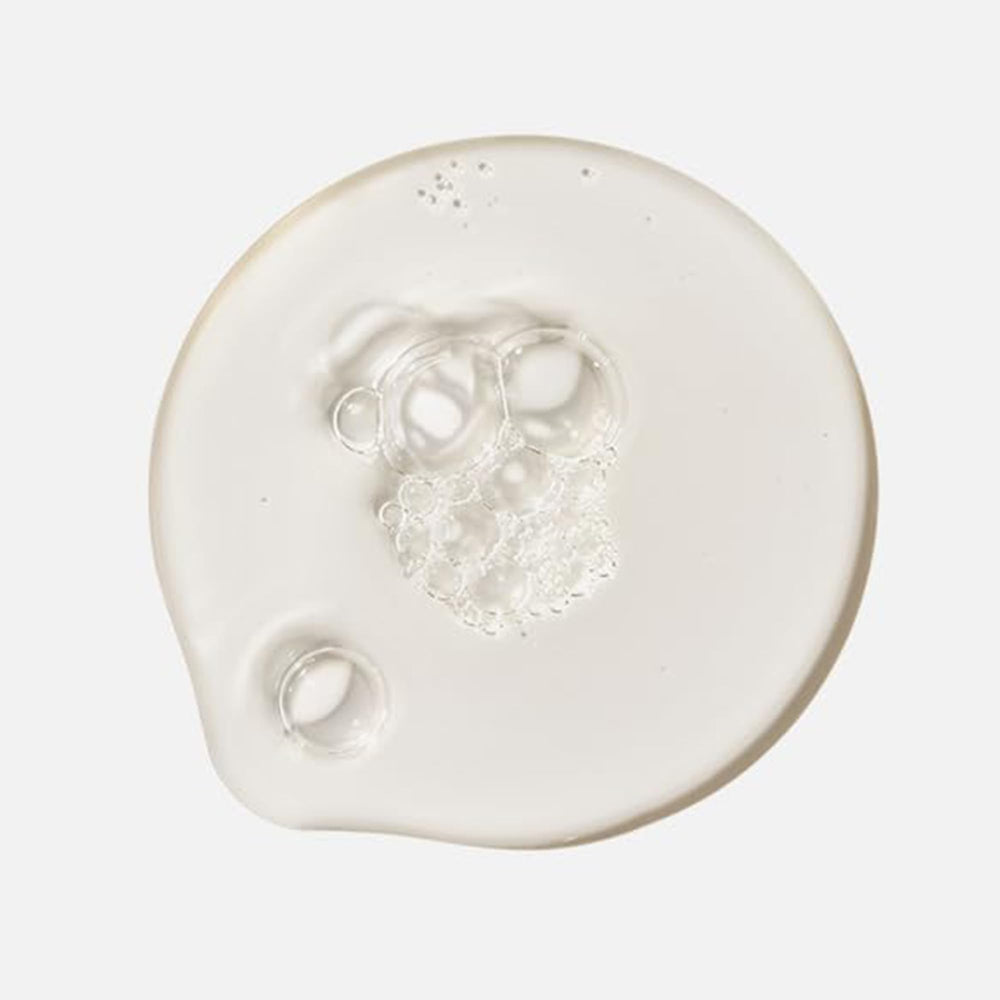 Close-up of SHANI DARDEN cleanser foam showing gentle lather