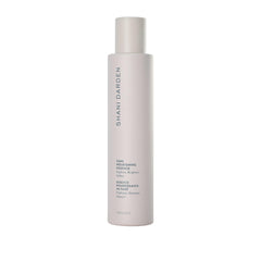 Shani Darden Sake Nourishing Essence bottle close-up showcases hydration and calm for dehydrated skin