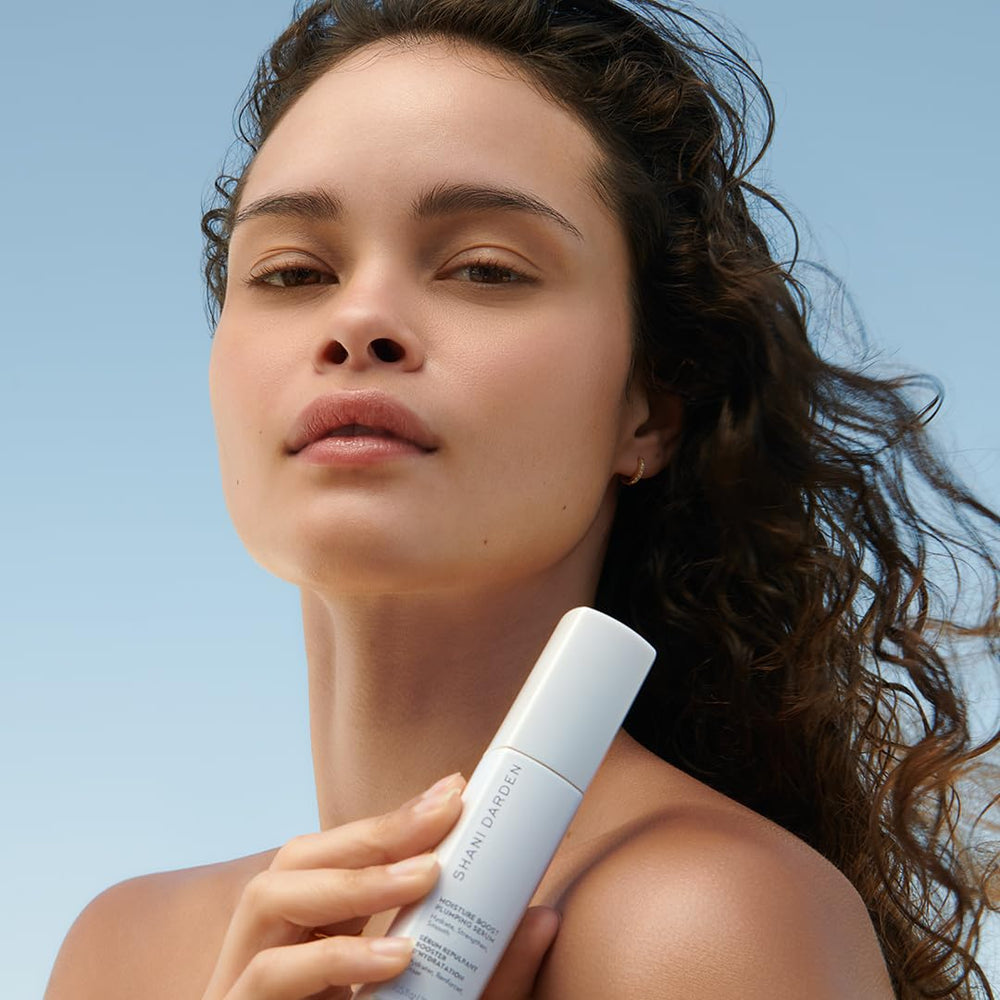 Evening routine shot applying serum before moisturizer for added hydration