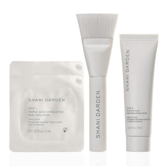 SHANI DARDEN Triple Acid Peel Kit Mini bottle close-up, suggesting smoother-looking skin.