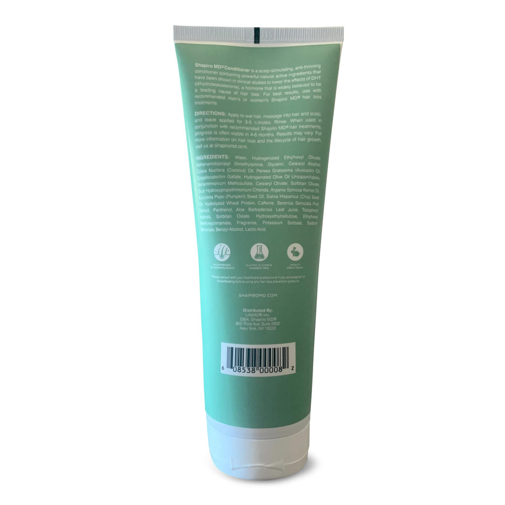 Shapiro MD conditioner beside damp hair for fuller look.