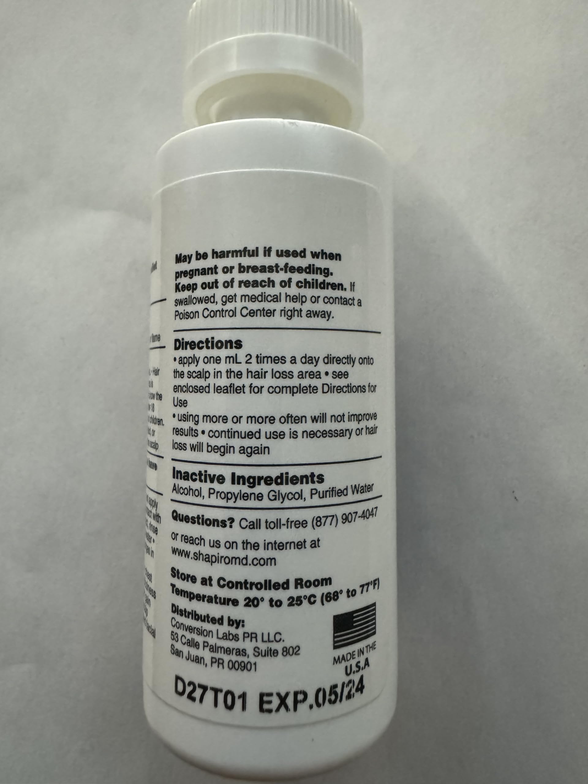 Shapiro MD Minoxidil 2% daily-use bottle with dropper.