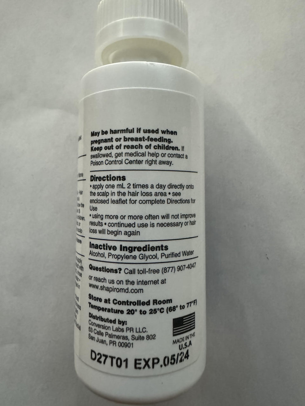 Shapiro MD Minoxidil 2% daily-use bottle with dropper.