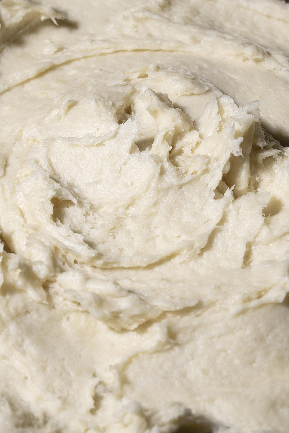 Vegan and cruelty-free Shea Radiance P.U.R.E. butter on a palm.