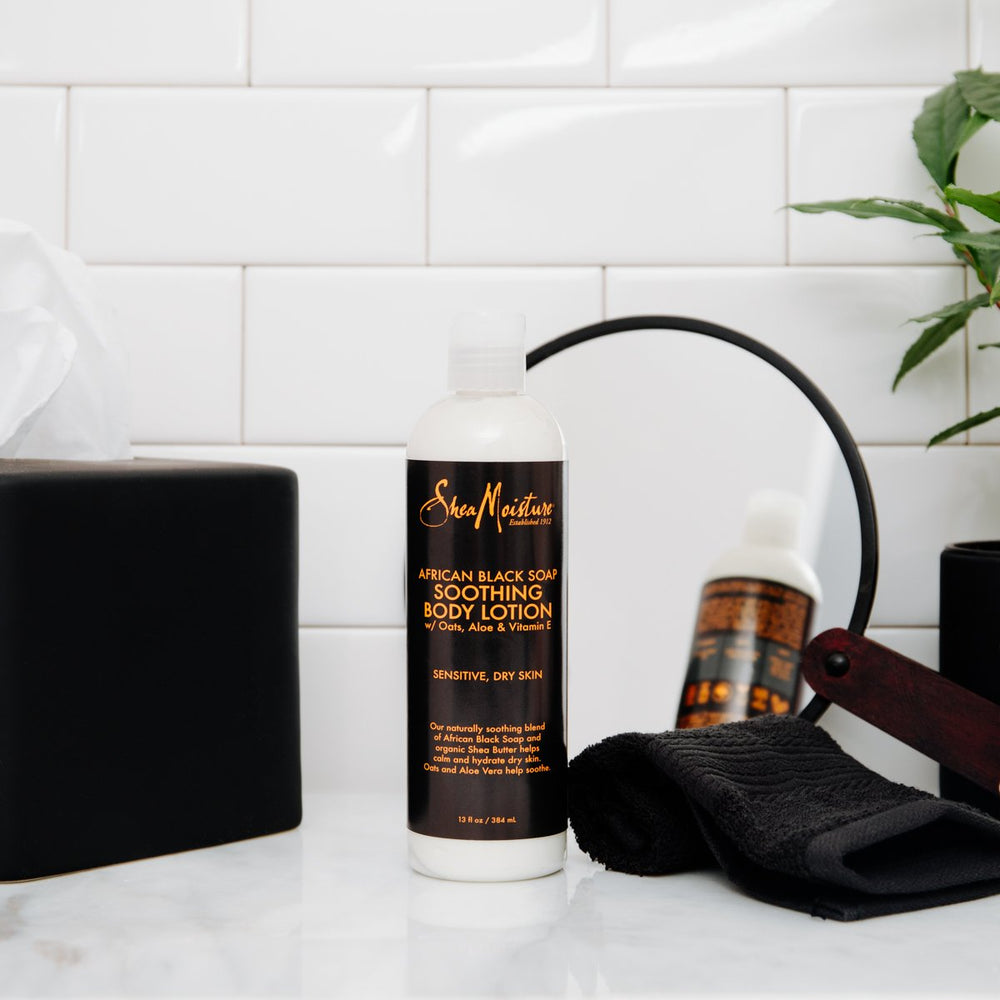 Creamy texture gliding on damp skin demonstrates easy absorption.