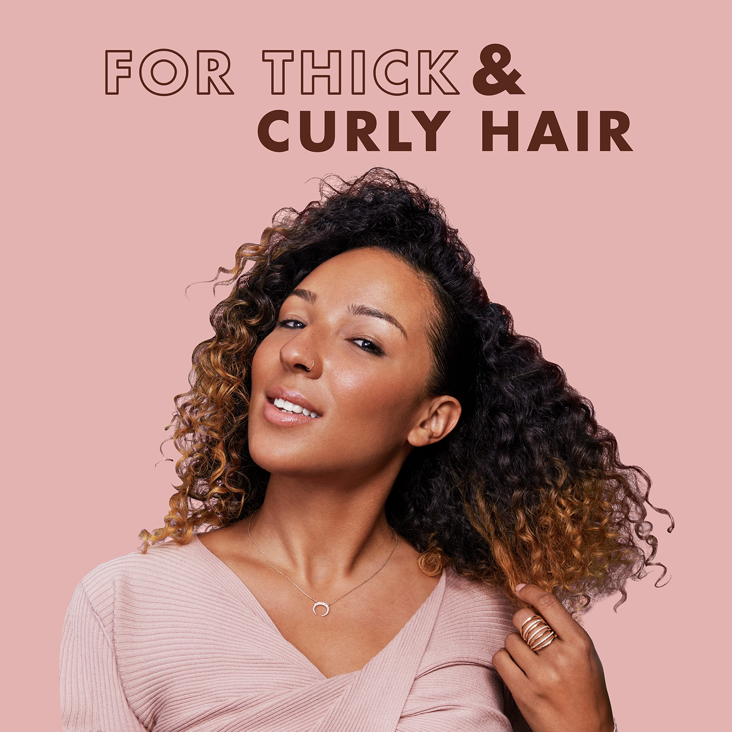 SheaMoisture Coconut Hibiscus Conditioner smooths and nourishes curls.