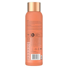 Glowing Radiance foam cleanses with tropical coconut aroma