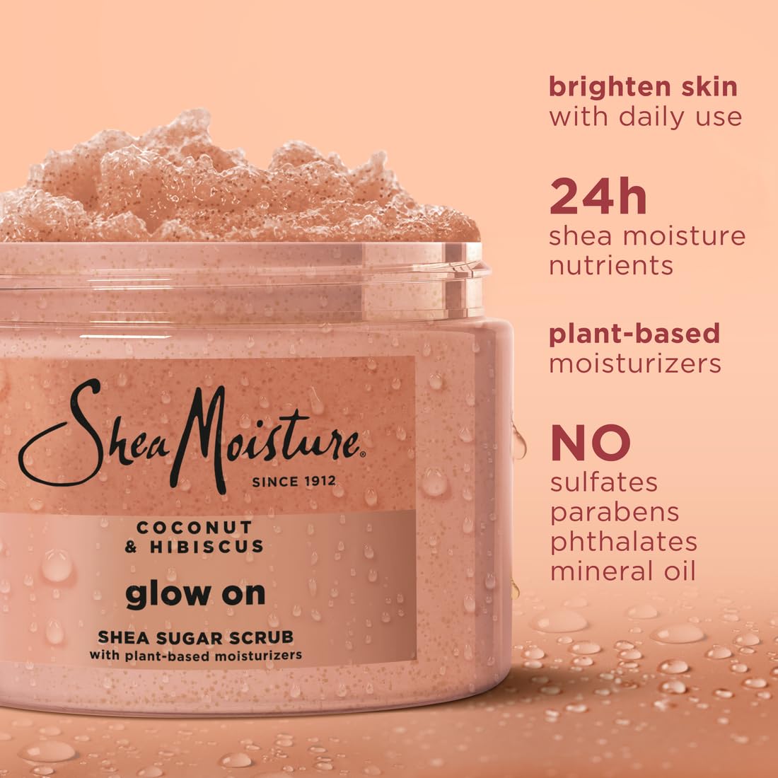 Sheamoisture Glowing Radiance sugar scrub ingredients highlight coconut oil and hibiscus for nourishment.