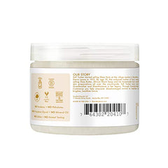 Hands warming SheaMoisture butter to melt for easy skin and hair application.