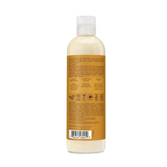 SheaMoisture Raw Shea Body Lotion on bathroom shelf
