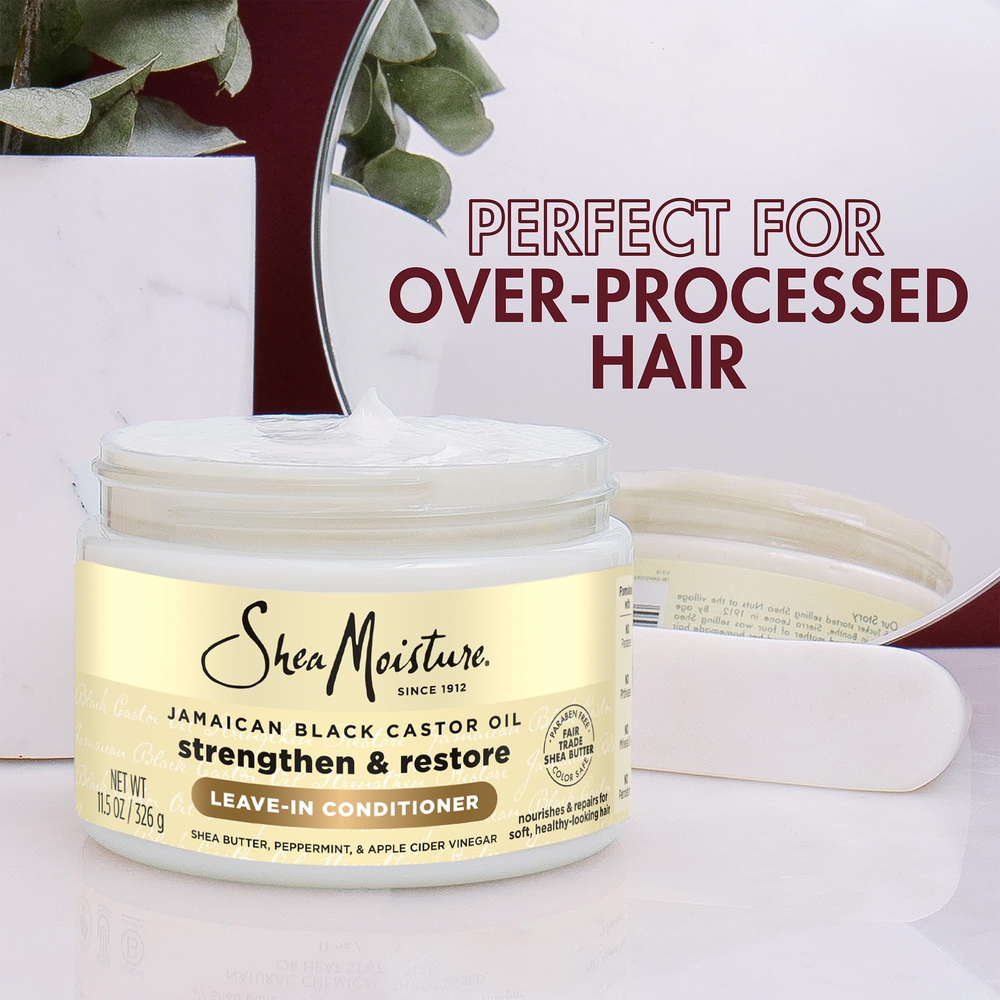 Curly hair lifestyle shot emphasizing healthy shine after use.