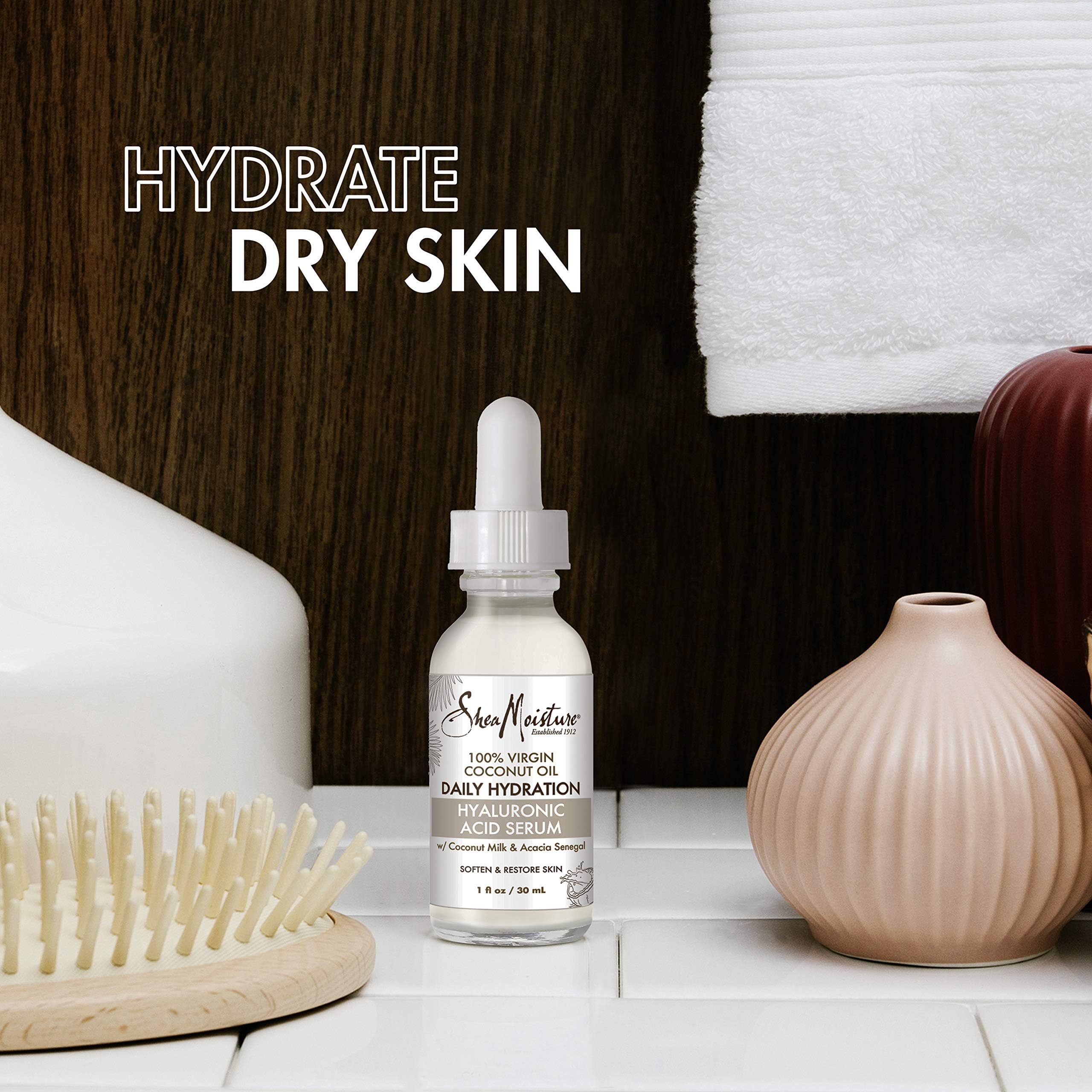 Applying SheaMoisture serum on clean skin for smooth radiance