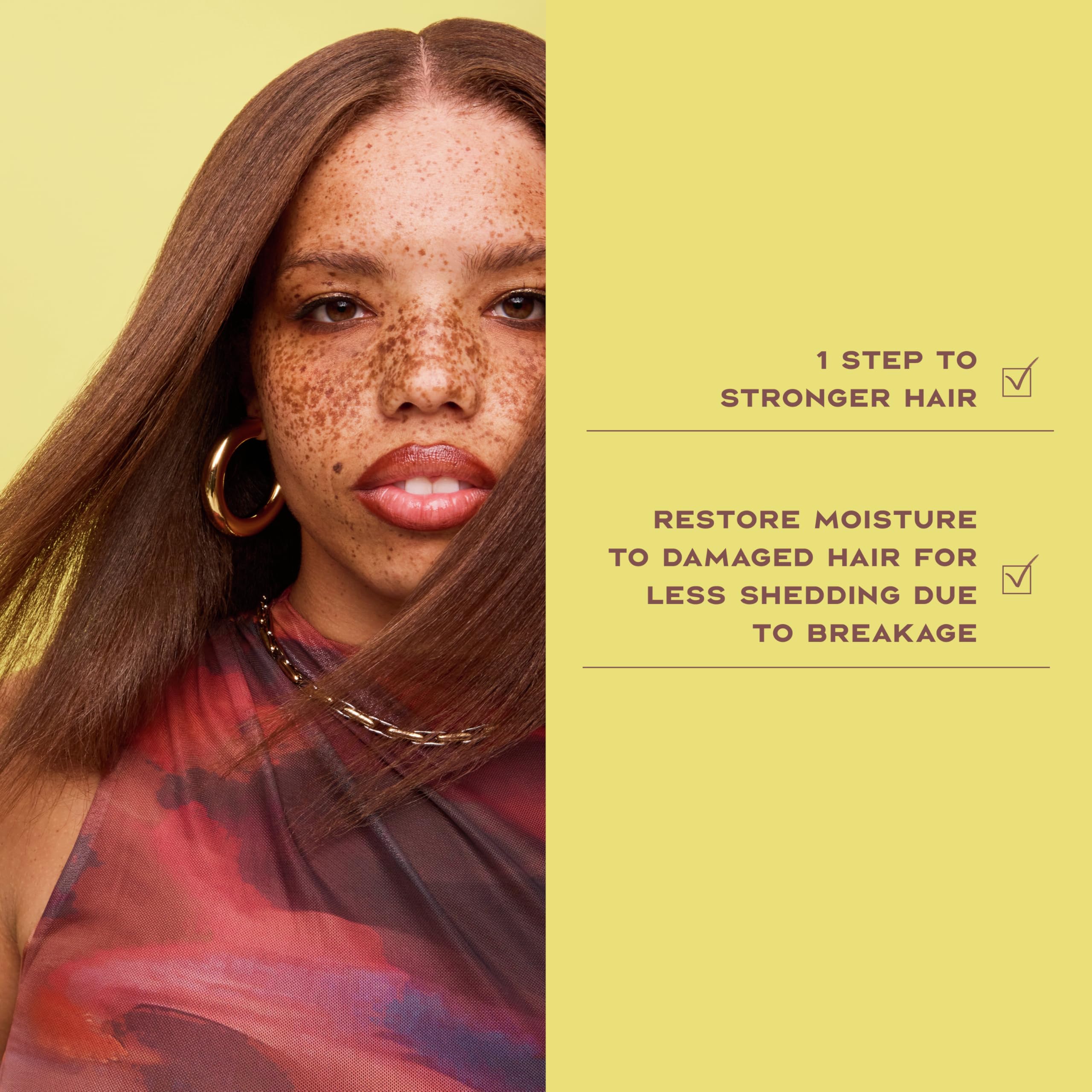 Application of Sheamoisture Strengthen & Restore conditioner on damp hair for nourishment