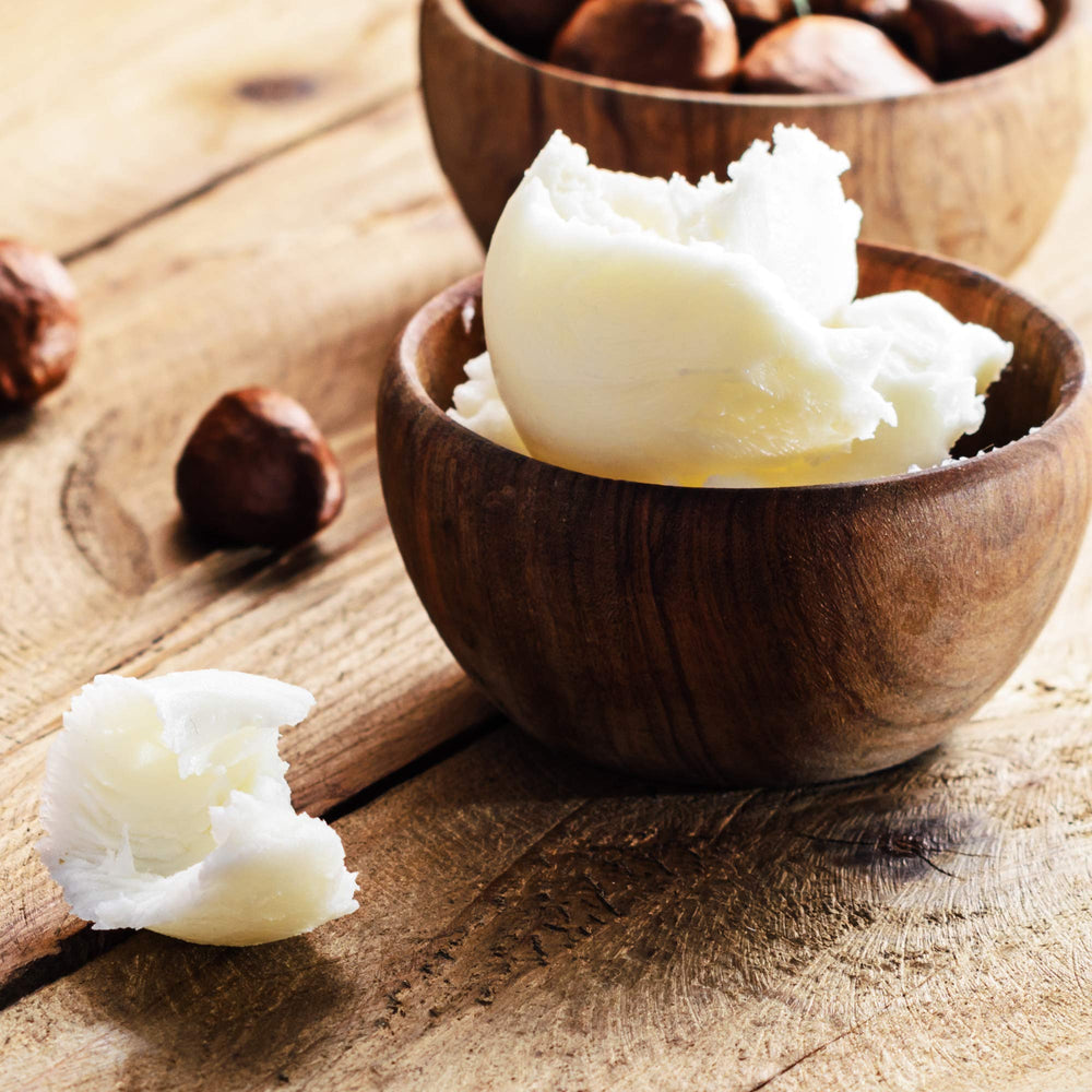 Elbows and heels being softened with Sheanefit shea butter