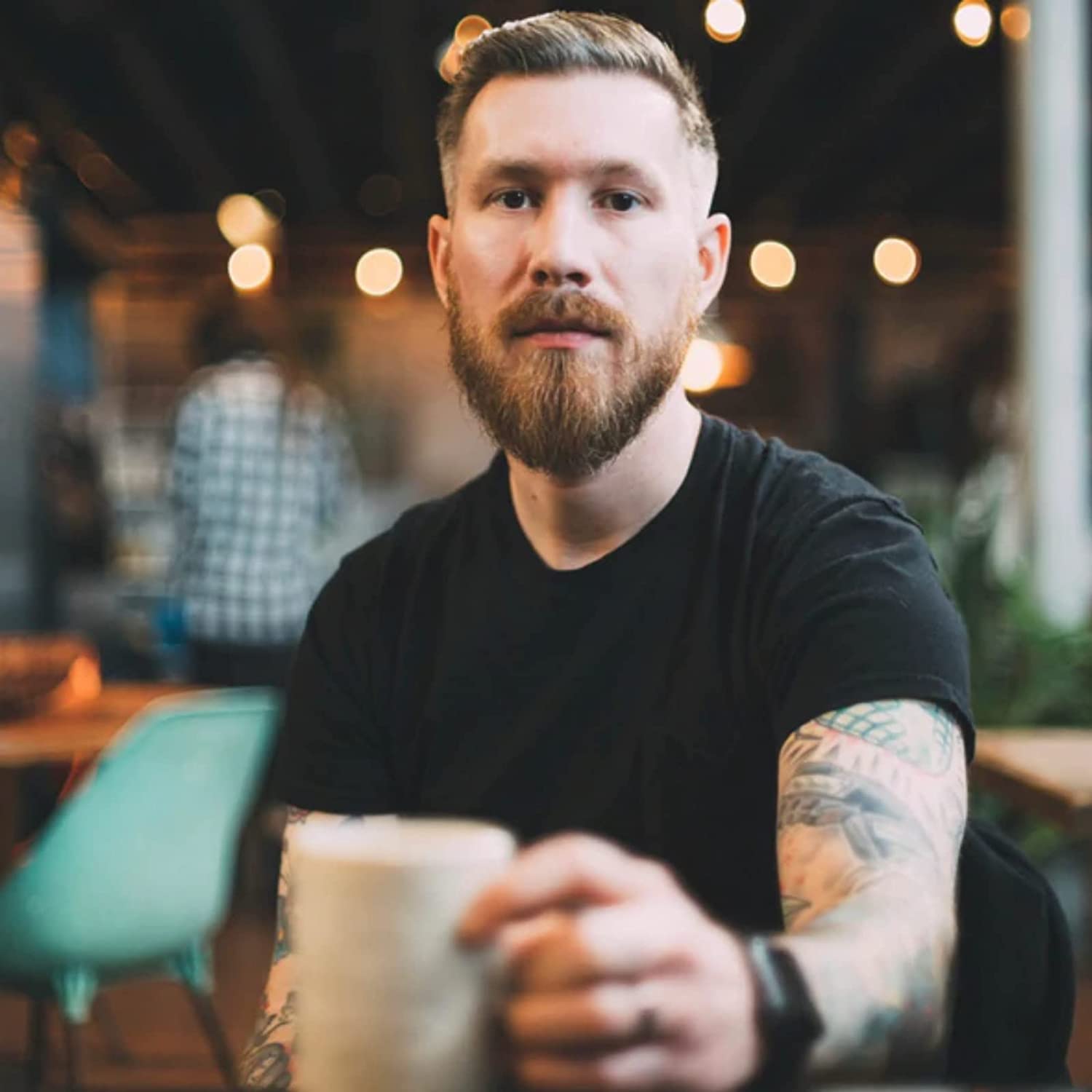 Beard styling with Easy Tiger pomade for tame, conditioned facial hair.