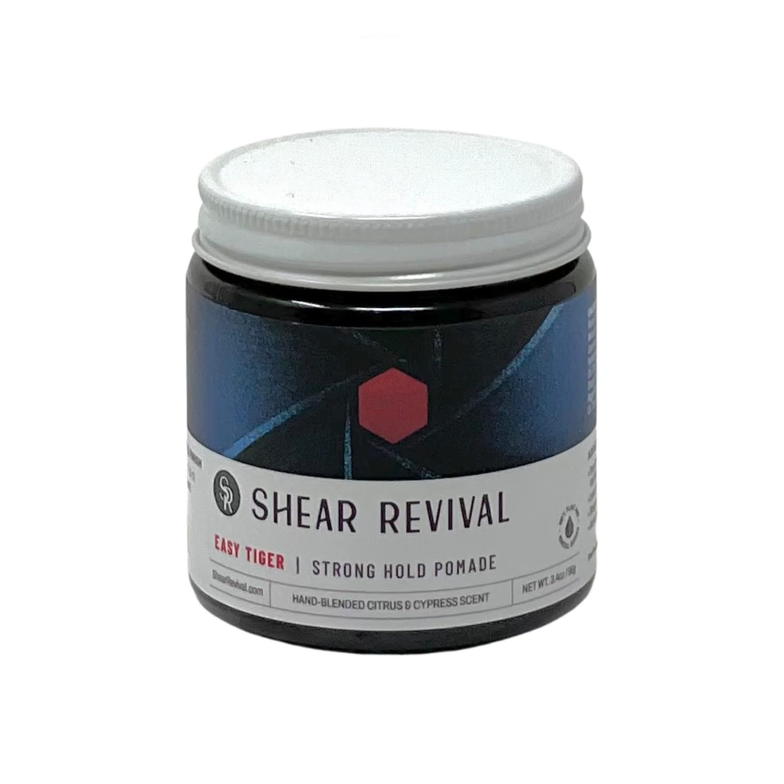 Shear Revival Easy Tiger pomade jar top view highlighting strong hold for short to medium hair.