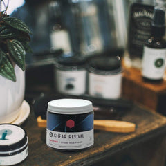 Close-up of waxy texture and citrus-cypress scent in Easy Tiger pomade.