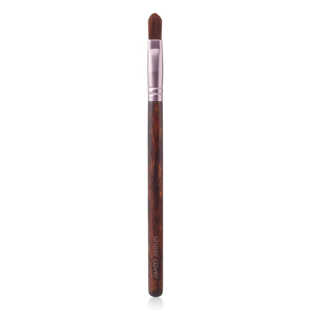 Sheer Cover under-eye application demonstrates lightweight cream that blends without caking.