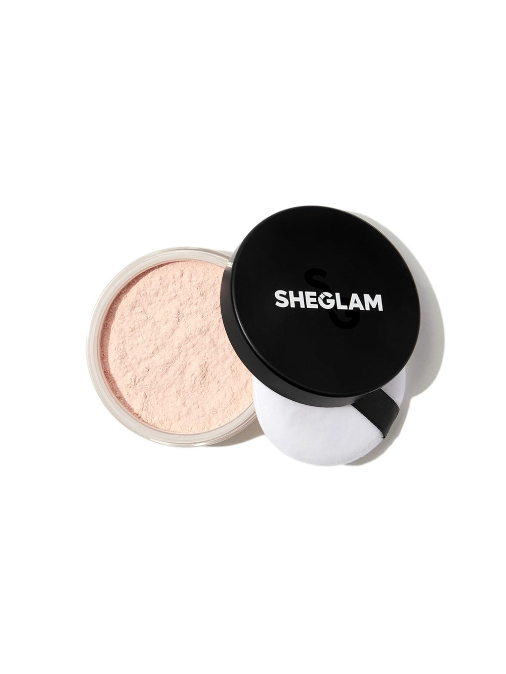 SHEGLAM Baked Glow Setting Powder packaging close-up highlighting oil-control properties.