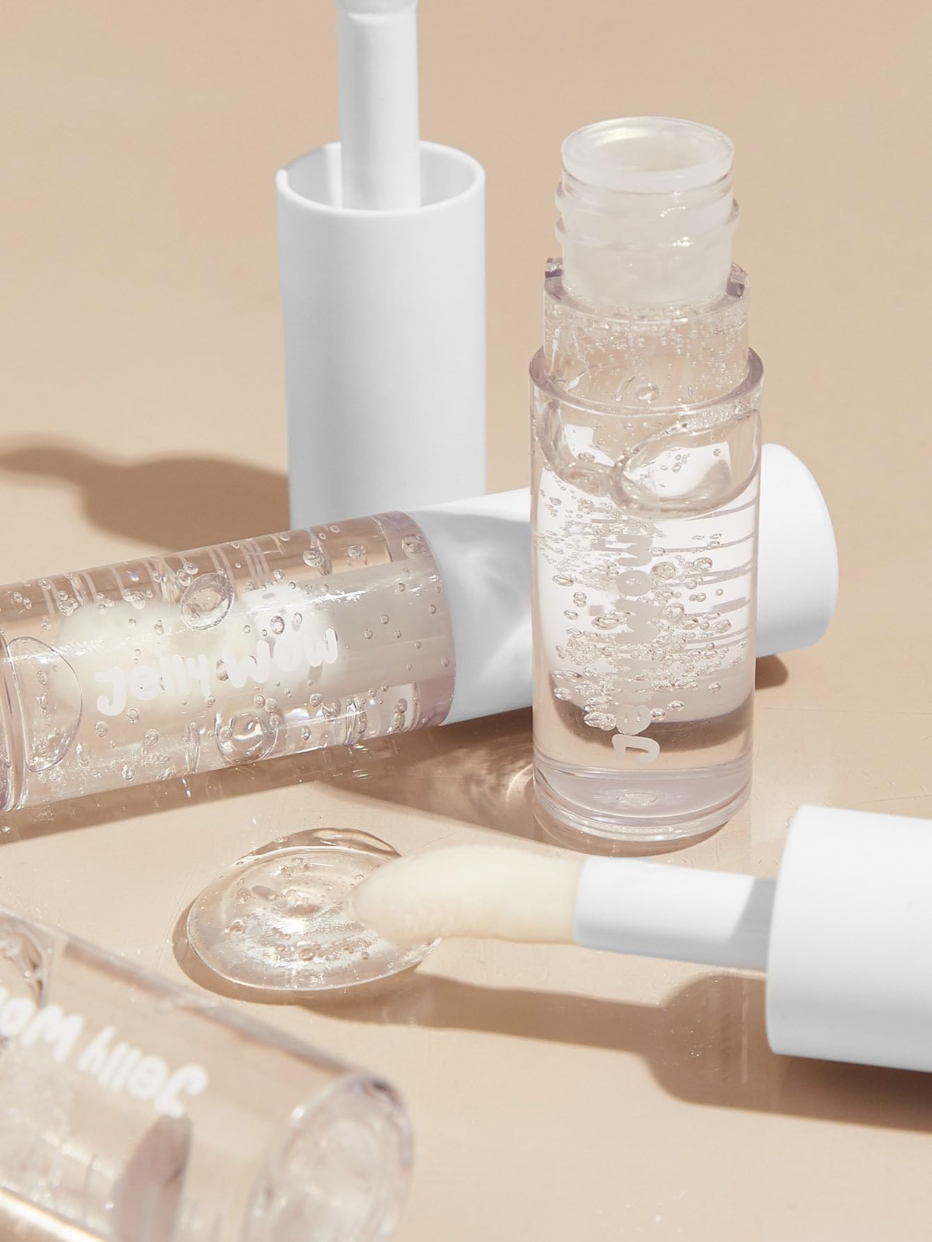SHEGLAM Jelly Wow lip oil cruelty-free packaging with Leaping Bunny badge.
