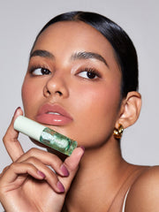 SHEGLAM Jelly Wow lip oil swatch on lips shows a high shine finish