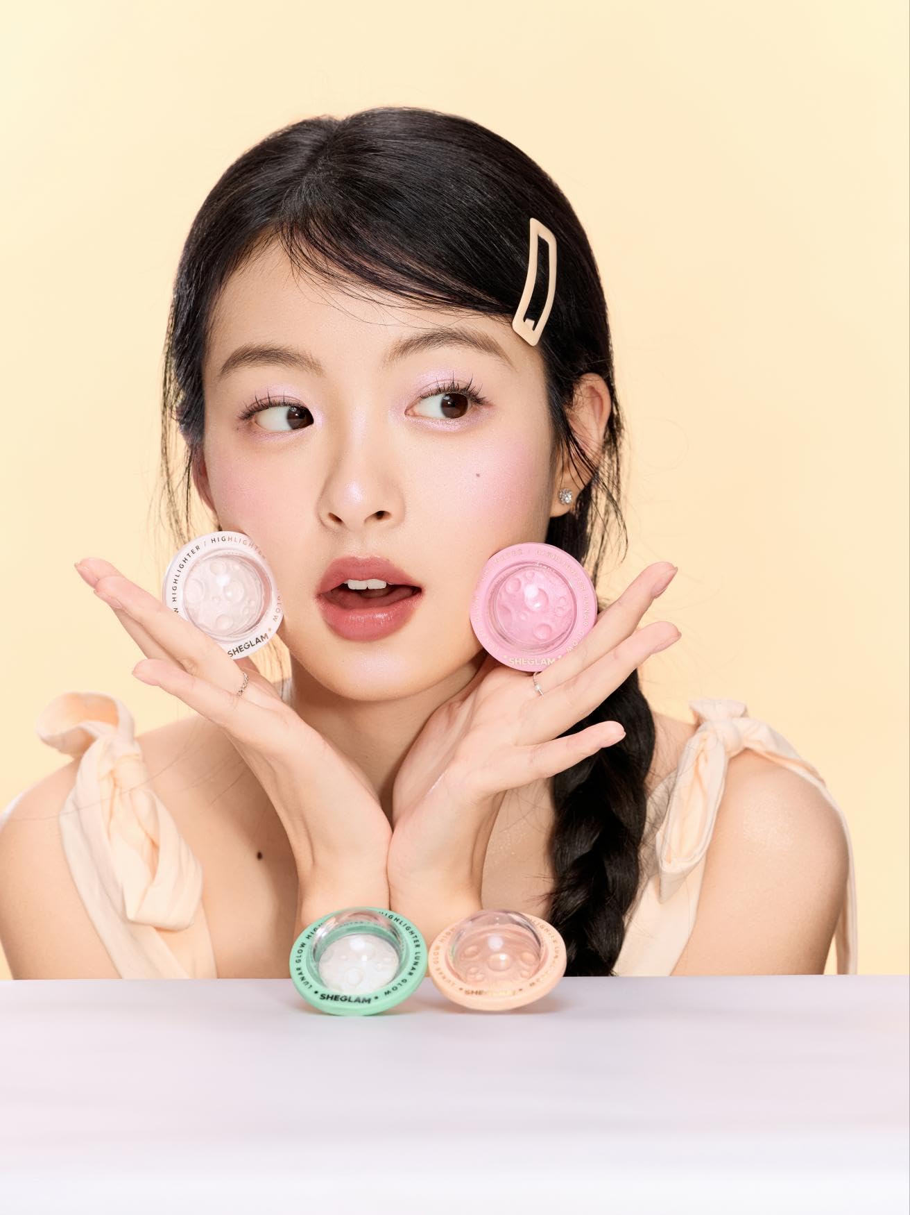 SHEGLAM Lunar Glow Highlighter shifts with light for dimensional depth.