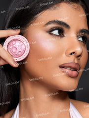 SHEGLAM Lunar Glow Highlighter silky cream texture blends smoothly on skin.