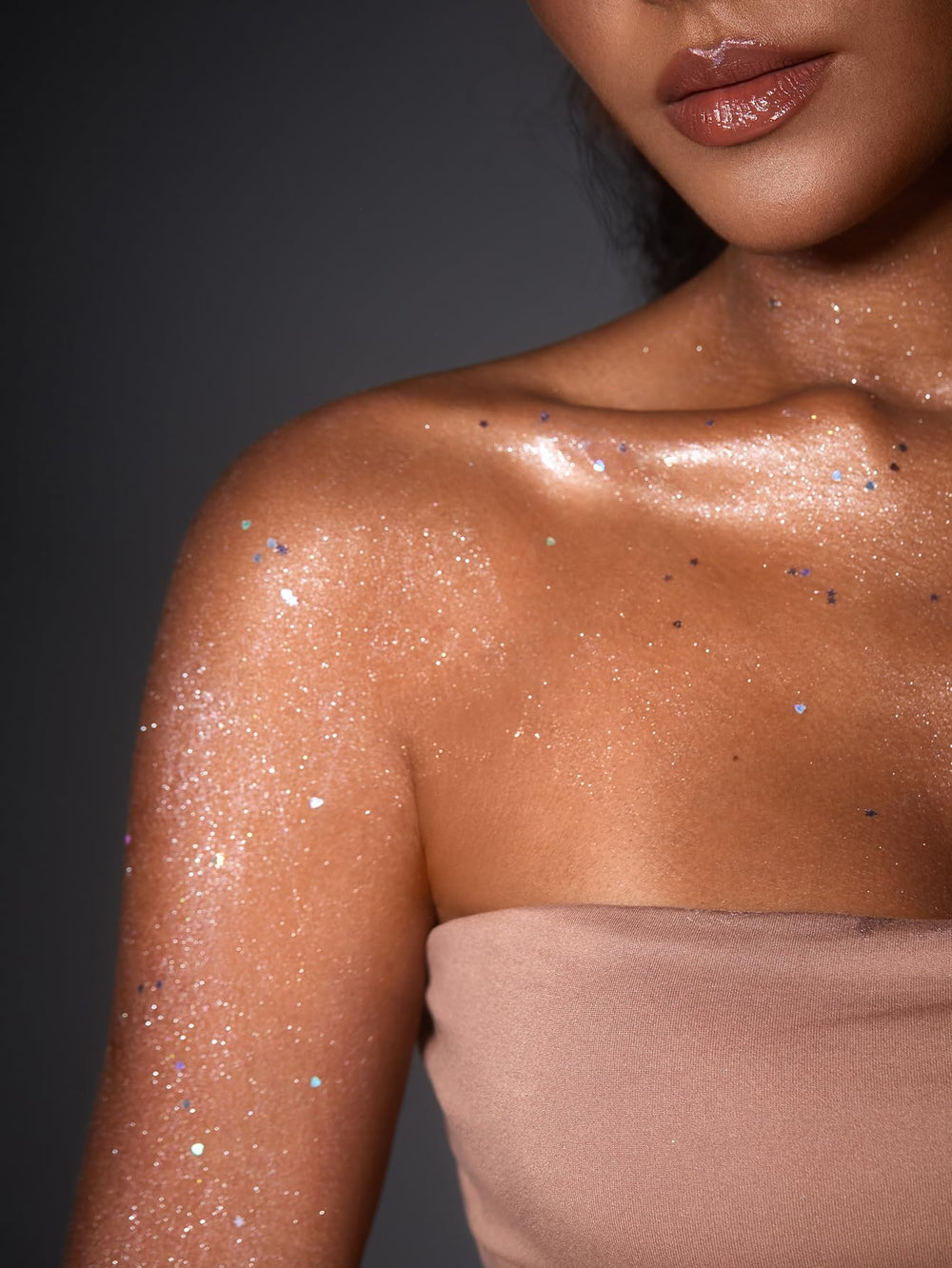 SHEGLAM Party Starter Face and Body Glow highlights radiant, balanced shimmer.