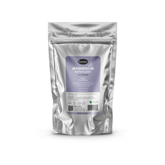 ShiKai magnesium bath flakes with arnica soaking in tub for soothing relaxation