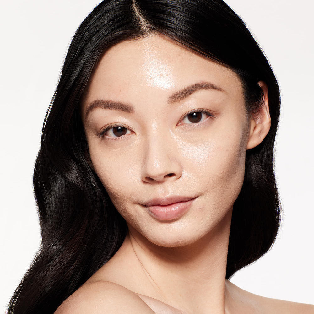Swatch demonstrates 12-hour wear and SPF 30 protection on skin.