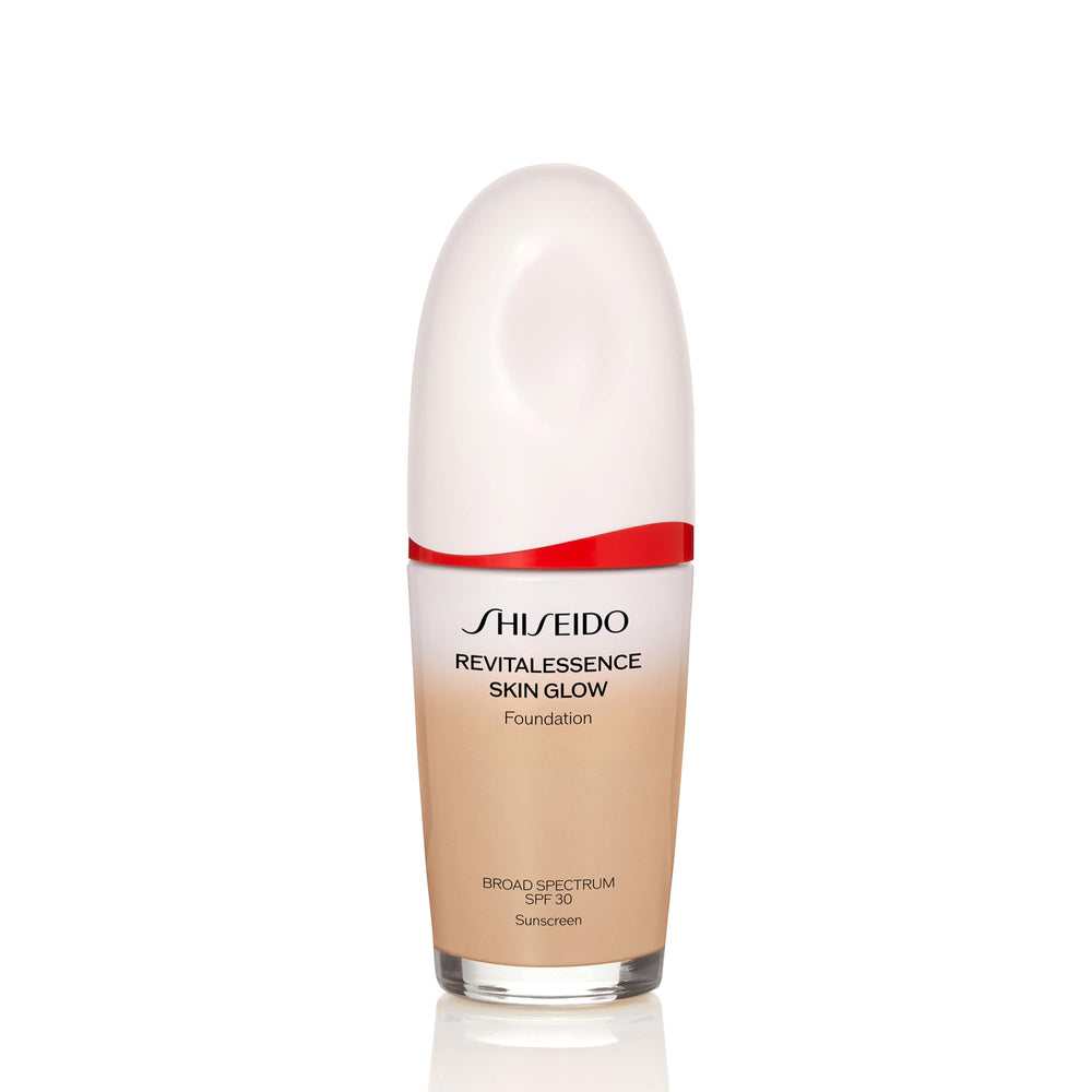 Shiseido RevitalEssence Skin Glow Foundation bottle with SPF 30 for luminous, even glow.