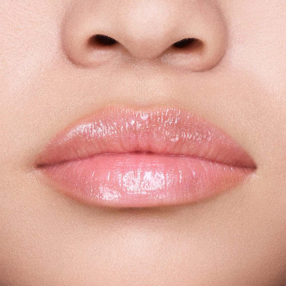 Application of Shiseido GelGloss Bare Pink 04 as a topcoat over color