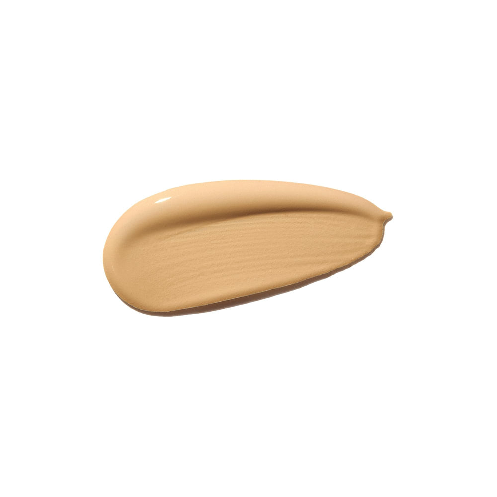 Close-up of Shiseido Synchro Skin foundation texture on skin showing natural finish.